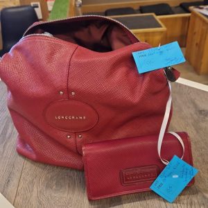 sac Longchamp couleur framboise (6406).